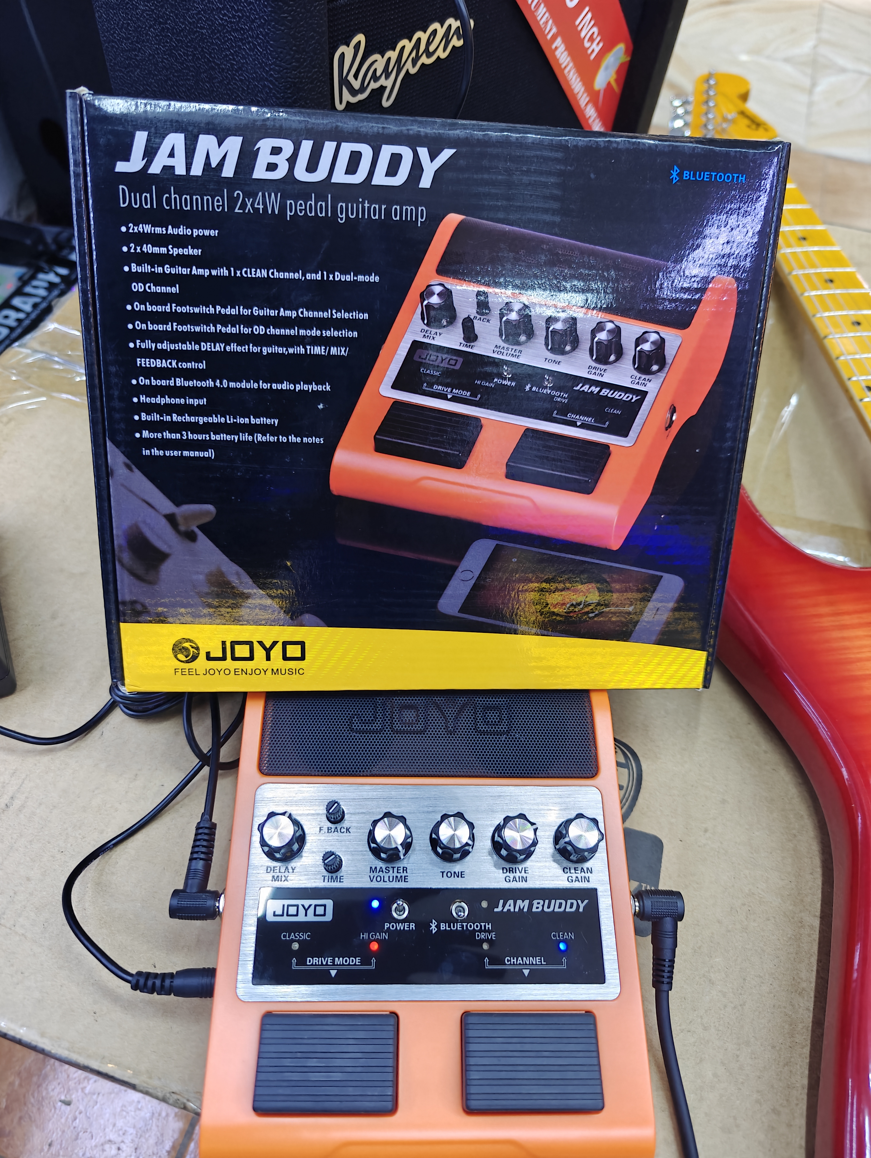 JOYO Jam Buddy rechargeable dual-channel pedal guitar amplifier with Bluetooth, delay effect, and built-in speakers for portable guitar practice.